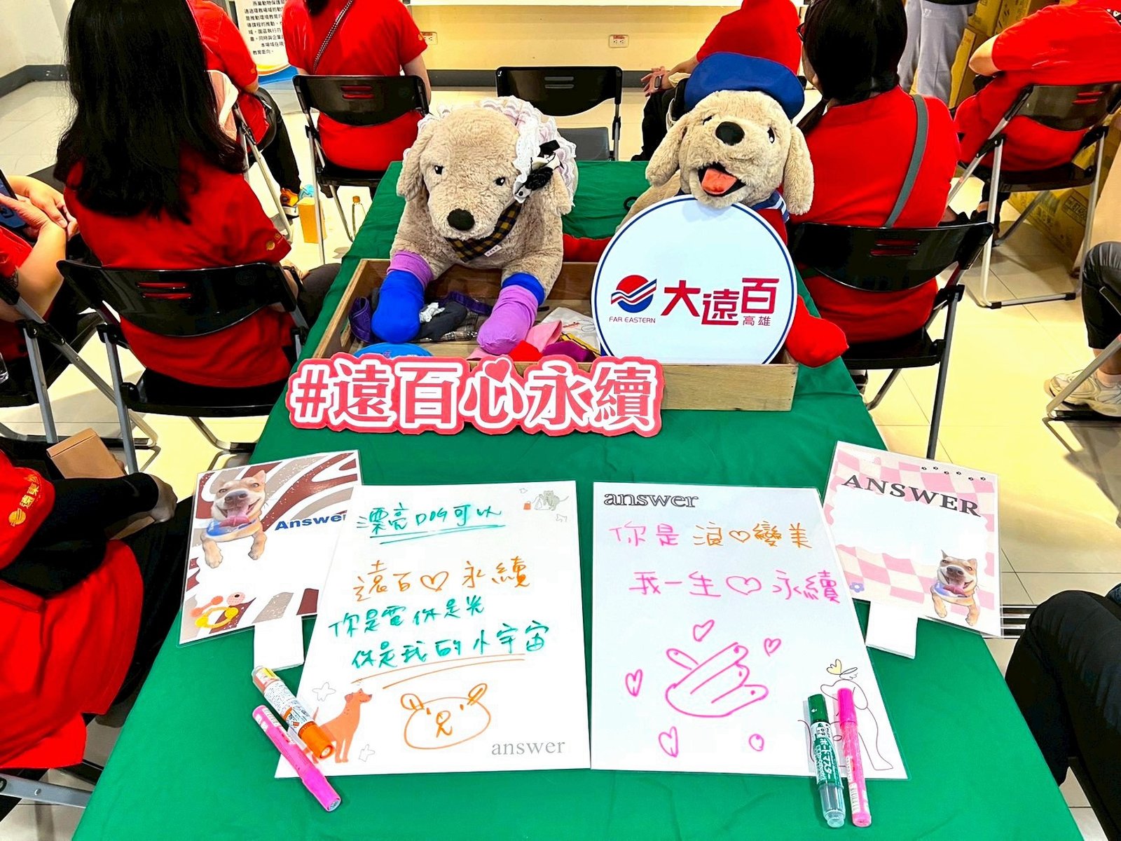 為狗狗設計專屬標語。(圖/高市動保護處)