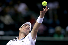 John Isner (Photo by Matthew Stockman/Getty Images)