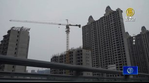中國房市續低迷 北京下調房貸利率及首付比例